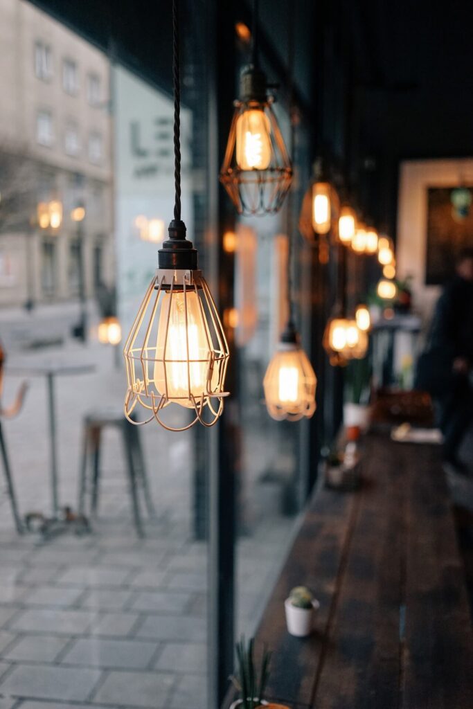 Restaurant interior with warm ambient lighting and hanging fixtures